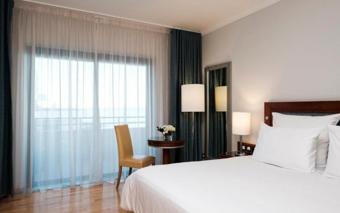 Slaapkamer van Resort Radisson Blu in Malta St Julians