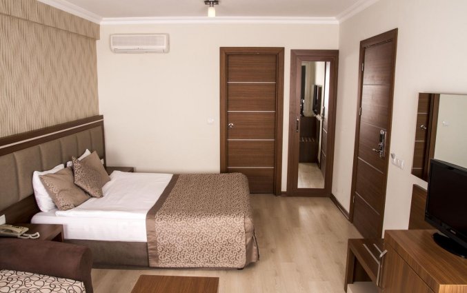 Slaapkamer van Hotel The Corner Park in Antalya