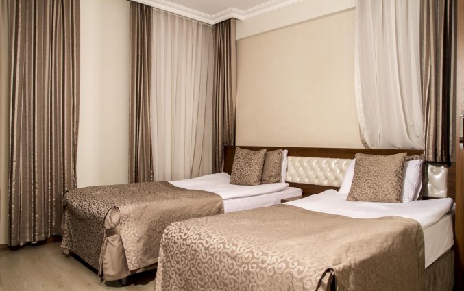 Slaapkamer van Hotel The Corner Park in Antalya