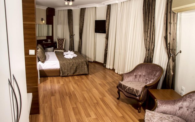 Slaapkamer van Hotel The Corner Park in Antalya