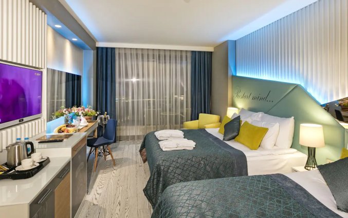 Slaapkamer van Hotel Wind of Lara in Antalya