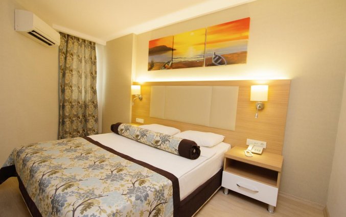 Slaapkamer van Hotel Blue Wave Suite in Alanya