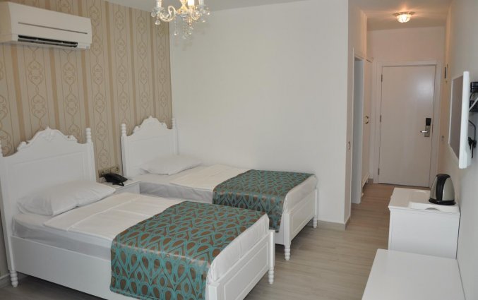 Slaapkamer van Hotel Kleopatra Atlas in Alanya