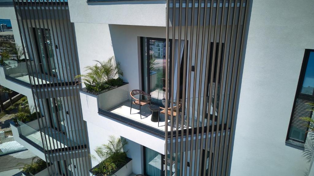 Veranda Hotel by Mirage - balkon met zithoek